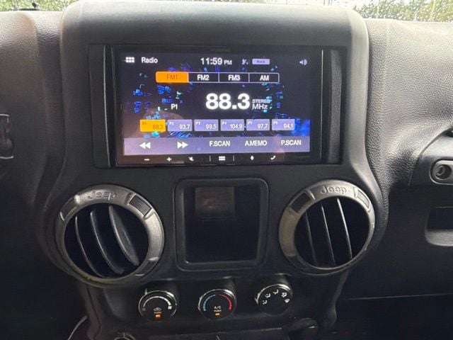 Pre-Owned 2016 Jeep Wrangler Unlimited Sport - photo - 9